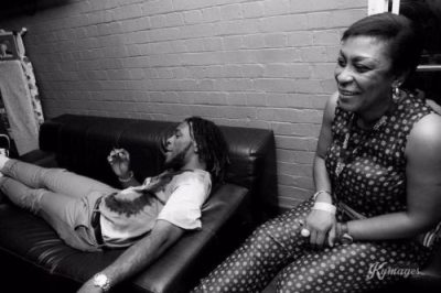 Watch Burna Boy Perform With His Mum Live On Stage (Video)