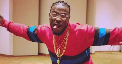 Lady Flaunts Peruzzi's Face In Between Her Breast (See Photos)