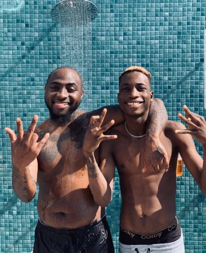 Davido & Lil Frosh Meets In Dubai, As He Throw His Fake Rolex In The Sea (Watch Video)