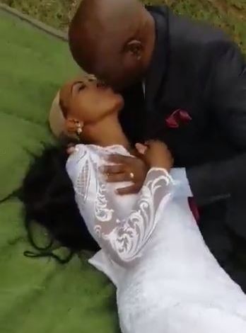 Drama as bride’s wig falls off as excited groom kisses her aggressively (VIDEO)